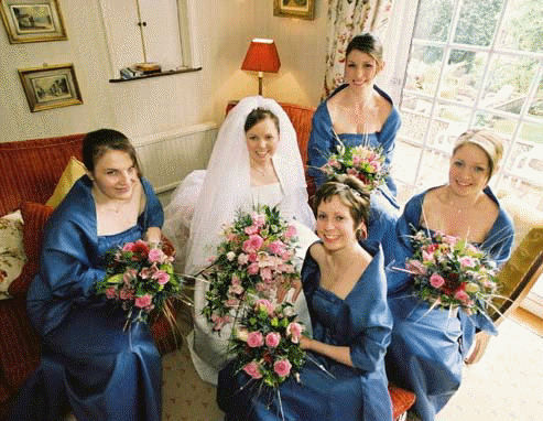 sarah and bridsmaids in house